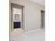 Hallway with carpet, neutral walls, and doors to bedrooms and bath at 4063 Villa Rafael Dr, Las Vegas, NV 89141