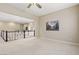 Spacious loft area with high ceilings and neutral color scheme at 4063 Villa Rafael Dr, Las Vegas, NV 89141