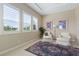 Sitting area with two chairs and view into bedroom at 4063 Villa Rafael Dr, Las Vegas, NV 89141