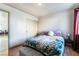 Comfortable bedroom with a double bed and plenty of closet space at 4116 W Delhi Ave, North Las Vegas, NV 89032