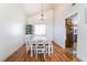 Bright dining room with hardwood floors and chandelier at 4116 W Delhi Ave, North Las Vegas, NV 89032