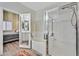 Bathroom with a bathtub, shower, and a view into a bedroom at 422 Blush Creek Pl, Las Vegas, NV 89144