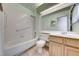 Clean bathroom, shower/tub combo and wood vanity at 4416 Inez Dr, Las Vegas, NV 89130