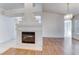 Living room with a built-in fireplace and hardwood floors at 4416 Inez Dr, Las Vegas, NV 89130