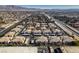 Aerial view of apartment buildings with ample parking and surrounding desert landscape at 4555 E Sahara Ave # 255, Las Vegas, NV 89104