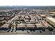 Aerial view of apartment buildings, parking lots, and surrounding desert landscape at 4555 E Sahara Ave # 255, Las Vegas, NV 89104