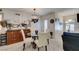 Bright dining area with glass table and white chairs at 4555 E Sahara Ave # 255, Las Vegas, NV 89104