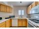 Well-lit kitchen featuring wood cabinets at 4555 E Sahara Ave # 255, Las Vegas, NV 89104