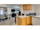 Kitchen with breakfast bar and living room view at 4555 E Sahara Ave # 255, Las Vegas, NV 89104