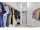 Walk-in closet with ample shelving and hanging space at 4655 Fuchsia Nights Ave # 103, North Las Vegas, NV 89084