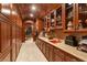 Butler's pantry with ample cabinetry and granite counters at 609 China Doll Pl, Henderson, NV 89012