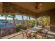 Relaxing covered patio with seating area and mountain views at 609 China Doll Pl, Henderson, NV 89012