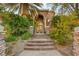 Stone steps leading to a grand entrance with a water fountain at 609 China Doll Pl, Henderson, NV 89012