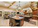 Open kitchen boasts granite counters and custom cabinetry at 609 China Doll Pl, Henderson, NV 89012