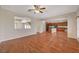 Kitchen with island, wood cabinets, and granite countertops at 6504 Birdcall St, North Las Vegas, NV 89084