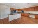 Kitchen with wood cabinets and granite countertops at 6504 Birdcall St, North Las Vegas, NV 89084