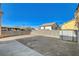 Spacious backyard with block wall and storage shed at 6536 Elk Creek Ln, Las Vegas, NV 89156