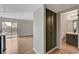 Modern bathroom with dark vanity and updated fixtures at 6536 Elk Creek Ln, Las Vegas, NV 89156