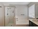 Bathroom with shower, tub, and updated fixtures at 6536 Elk Creek Ln, Las Vegas, NV 89156