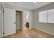 Bedroom with wood floors, closet and en-suite bathroom at 6536 Elk Creek Ln, Las Vegas, NV 89156