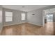 Living room with light gray walls and wood-look flooring at 6536 Elk Creek Ln, Las Vegas, NV 89156