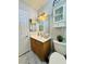 Bathroom featuring a vanity, a cabinet, and a toilet at 7329 Restful Springs Ct, Las Vegas, NV 89128