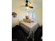 Bedroom featuring a ceiling fan and window with natural light and a plush teddy bear at 7329 Restful Springs Ct, Las Vegas, NV 89128