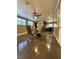 Bright dining room with tile floors and view to a large window at 7329 Restful Springs Ct, Las Vegas, NV 89128