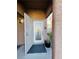 Inviting front entrance features a security screen door and decorative glass door at 7329 Restful Springs Ct, Las Vegas, NV 89128