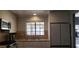 Modern kitchen with stainless steel appliances, stone countertops and bright light at 7329 Restful Springs Ct, Las Vegas, NV 89128