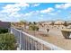 Landscaped backyard with gravel and a chain link fence at 788 Flowing Meadow Dr, Henderson, NV 89014