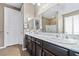 Modern bathroom with double sinks and walk-in shower at 788 Flowing Meadow Dr, Henderson, NV 89014