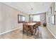 Dining area with wood table and chandelier at 788 Flowing Meadow Dr, Henderson, NV 89014