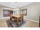 Elegant dining room features a large table, chandelier, and built-in cabinetry at 788 Flowing Meadow Dr, Henderson, NV 89014