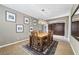 Modern dining room with hardwood floors and large mirror at 788 Flowing Meadow Dr, Henderson, NV 89014