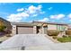 Two-car garage and neutral-color exterior at 788 Flowing Meadow Dr, Henderson, NV 89014