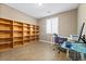 Home office with built-in shelves and a workspace at 788 Flowing Meadow Dr, Henderson, NV 89014