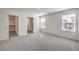 Main bedroom with carpet, walk-in closet, and ensuite at 790 Ruby Sedona Ave # Lot 149, North Las Vegas, NV 89081