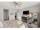 Spacious bedroom with large dresser and ceiling fan at 8113 Brown Clay Ave, Las Vegas, NV 89113