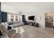 Spacious living room featuring a sectional sofa and a fireplace at 8113 Brown Clay Ave, Las Vegas, NV 89113