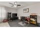 Home office with desk, TV, and built-in shelving at 8113 Brown Clay Ave, Las Vegas, NV 89113