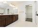 Modern bathroom with double vanity and walk-in shower at 8428 Summers Ranch Ct, Las Vegas, NV 89139