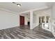 Spacious dining room with wood-look floors and a chandelier at 8428 Summers Ranch Ct, Las Vegas, NV 89139