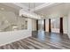 Living room with wood-look floors and sliding glass doors at 8428 Summers Ranch Ct, Las Vegas, NV 89139