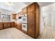 Kitchen with double oven and ample wood cabinetry at 845 Palo Verde Dr, Henderson, NV 89015