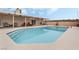 Relaxing kidney-shaped pool with spacious surrounding patio at 845 Palo Verde Dr, Henderson, NV 89015