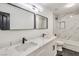 Elegant bathroom with double vanity, marble countertops, and a soaking tub at 8509 Copper Falls Ave, Las Vegas, NV 89129