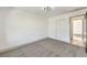 Bedroom with carpet flooring, sliding door closet, and window at 8509 Copper Falls Ave, Las Vegas, NV 89129