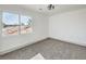 Bright bedroom with carpet flooring and window at 8509 Copper Falls Ave, Las Vegas, NV 89129