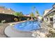 Refreshing kidney-shaped pool with ample surrounding space at 8509 Copper Falls Ave, Las Vegas, NV 89129